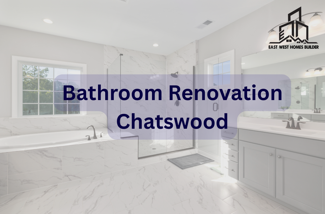 Modern marble bathroom renovation Chatswood by East West Homes Builder featuring freestanding bathtub, glass shower enclosure, and double vanity with natural lighting.
